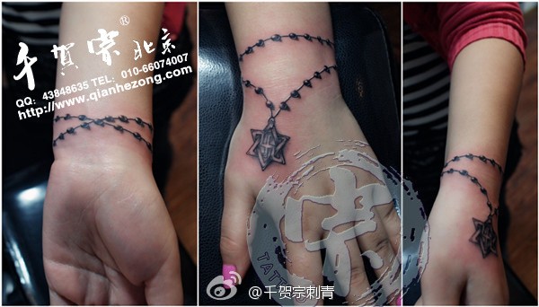 女生手腕潮流时尚的黑灰手链纹身图案