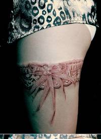 女生腿部性感时尚的蕾丝纹身图案