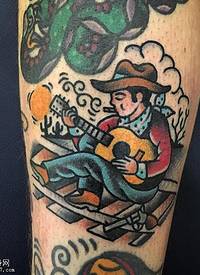 小腿上的音乐人纹身图案