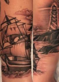 手臂纹身图片 男生手臂上帆船和灯塔纹身图片