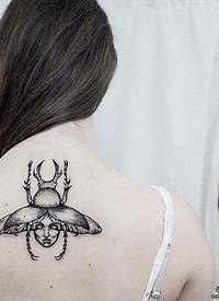 背部欧美甲虫人像点刺纹身图案