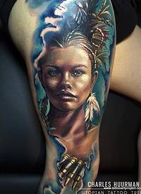 腿部现实主义风格的彩色印度女子肖像纹身