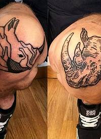 腿部膝盖个性黑色犀牛头像纹身图案