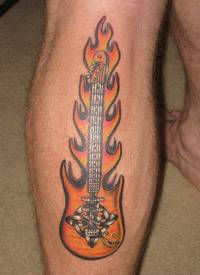 小腿处吉他与火焰的个性组合纹身图案
