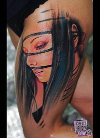 大腿彩色部落妇女肖像纹身图案