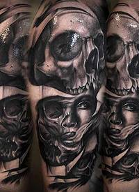 大臂黑灰恶魔般的女人肖像骷髅纹身图案