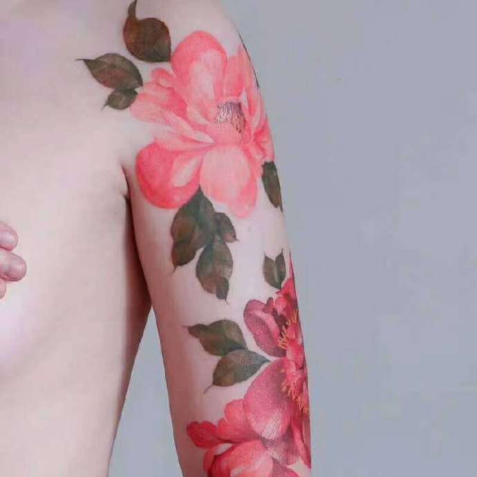 粉色妖娆的一组花卉纹身图片